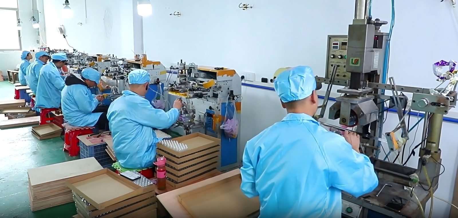 Workers on the packaging assembly line